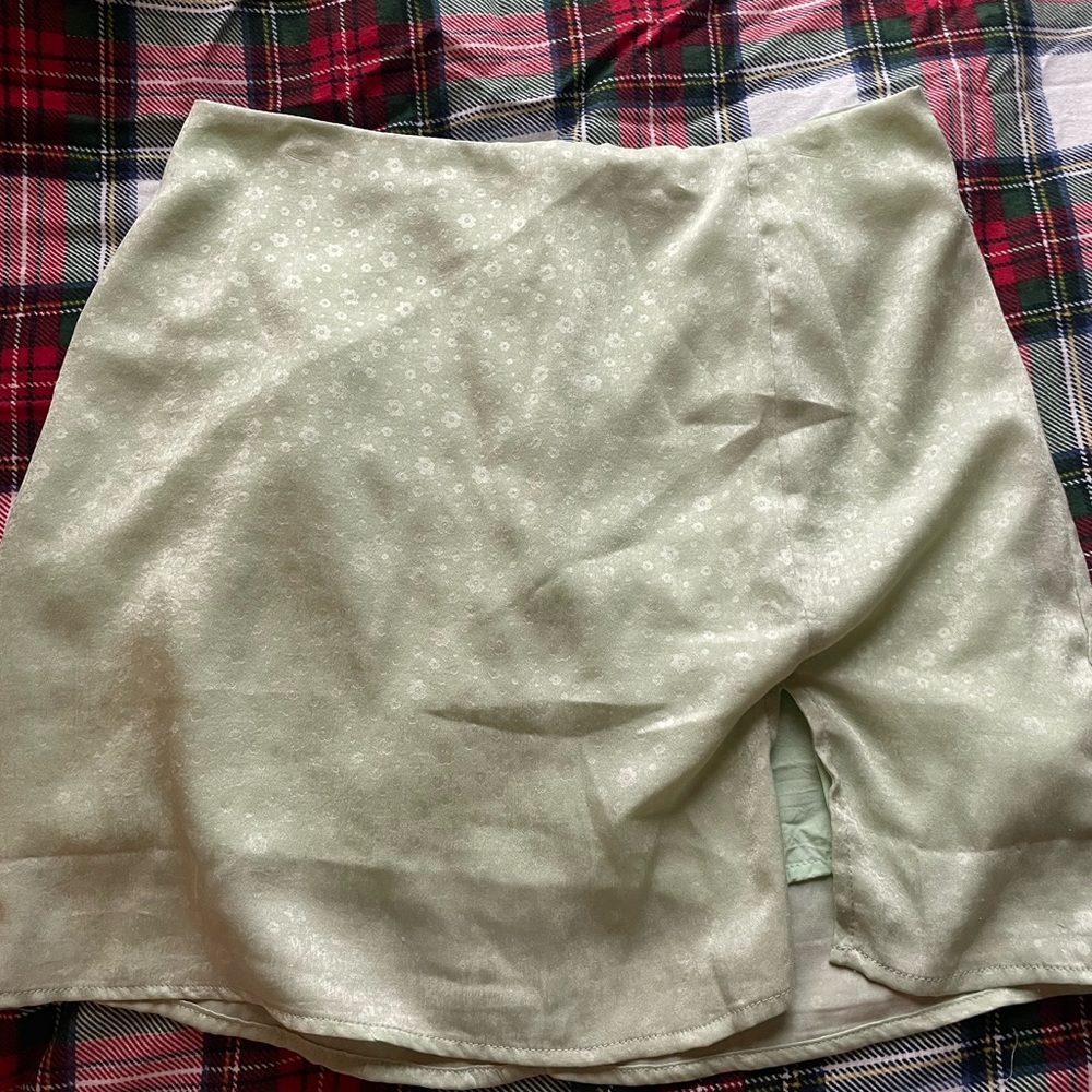 green mini skirt with slit